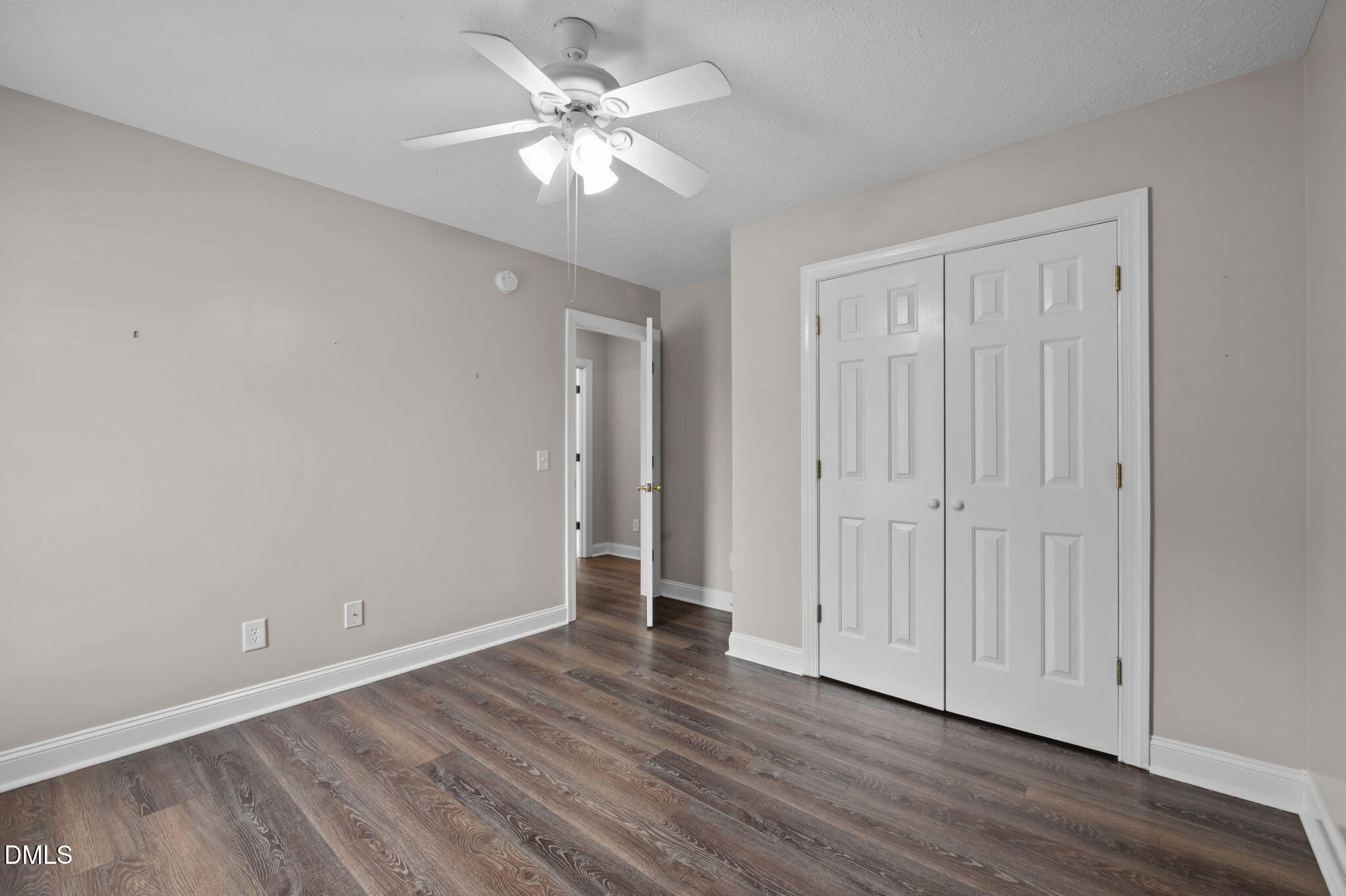 427 Fletcher Ridge Road Timberlake, NC 27583 - Photo 29 of 42 a view of an empty room with wooden floor