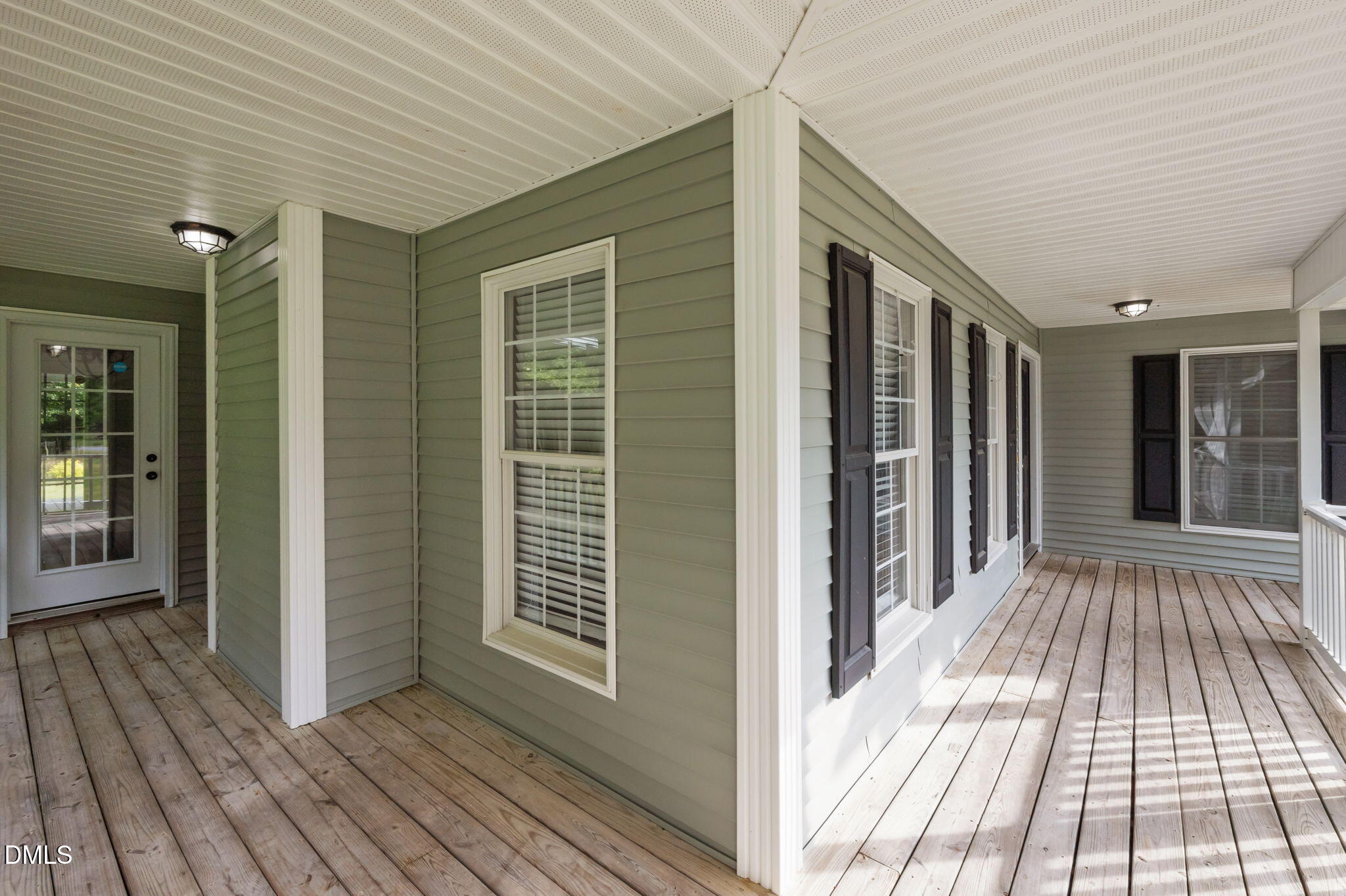 427 Fletcher Ridge Road Timberlake, NC 27583 - Photo 37 of 42 a view of a house with a door