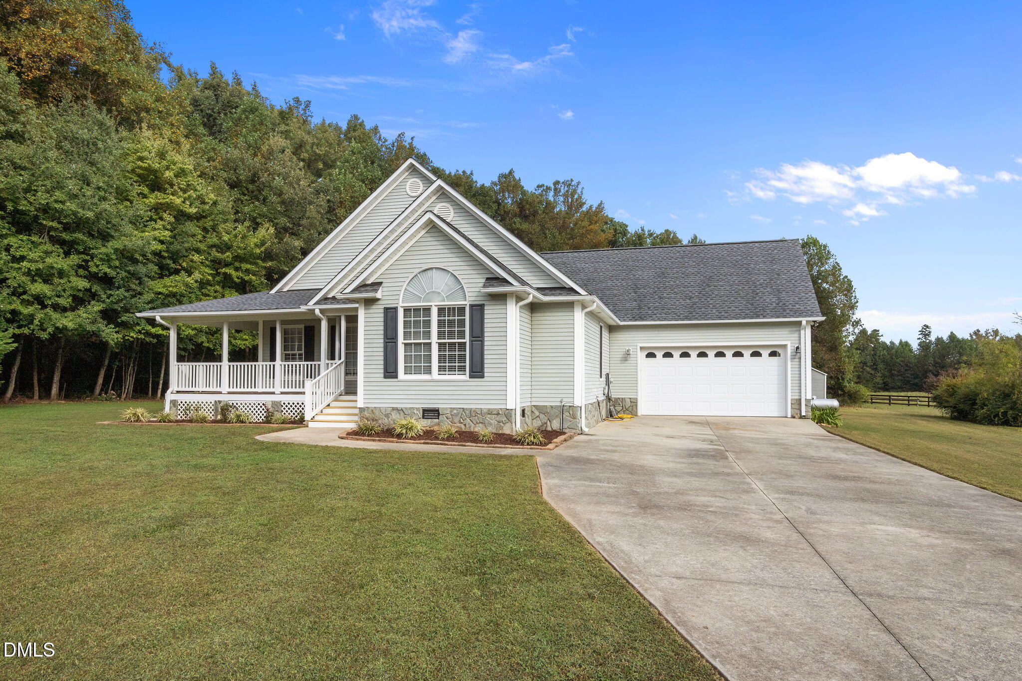 427 Fletcher Ridge Road Timberlake, NC 27583 - Photo 42 of 42 a front view of a house with a yard