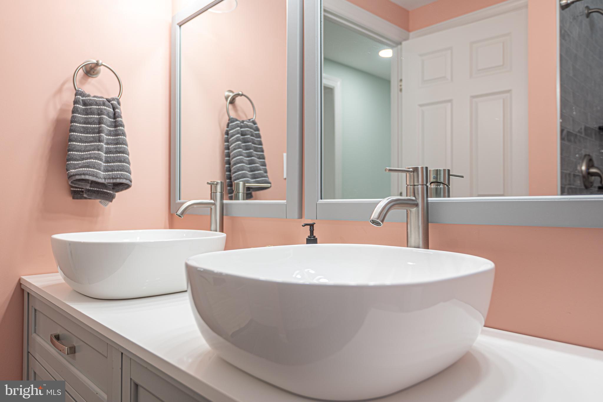 138 Old Wharf Road Ocean City, MD 21842 - Photo 16 of 33 a white bath tub sitting in a bathroom