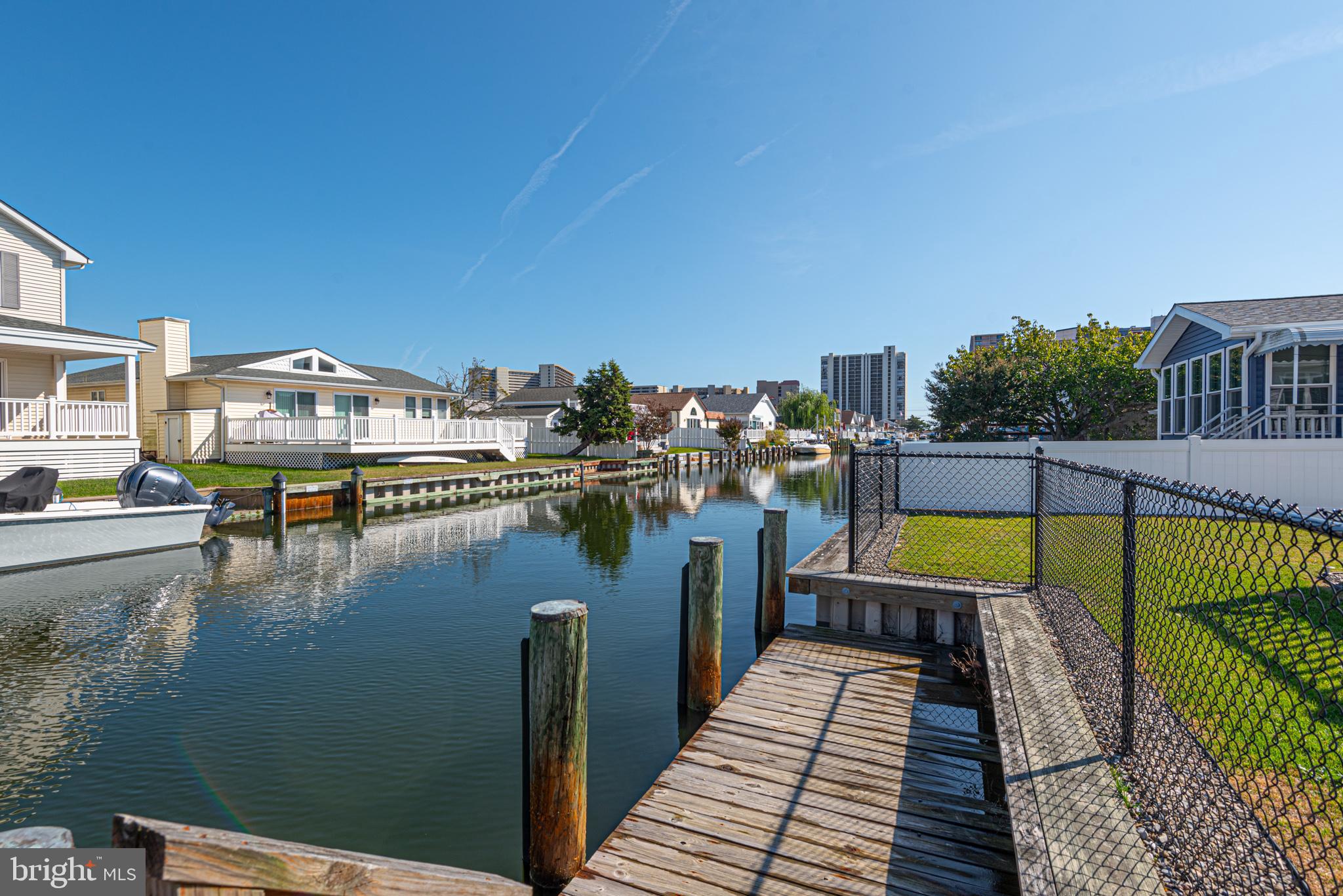 138 Old Wharf Road Ocean City, MD 21842 - Photo 29 of 33 a view of a swimming pool with a lounge chair