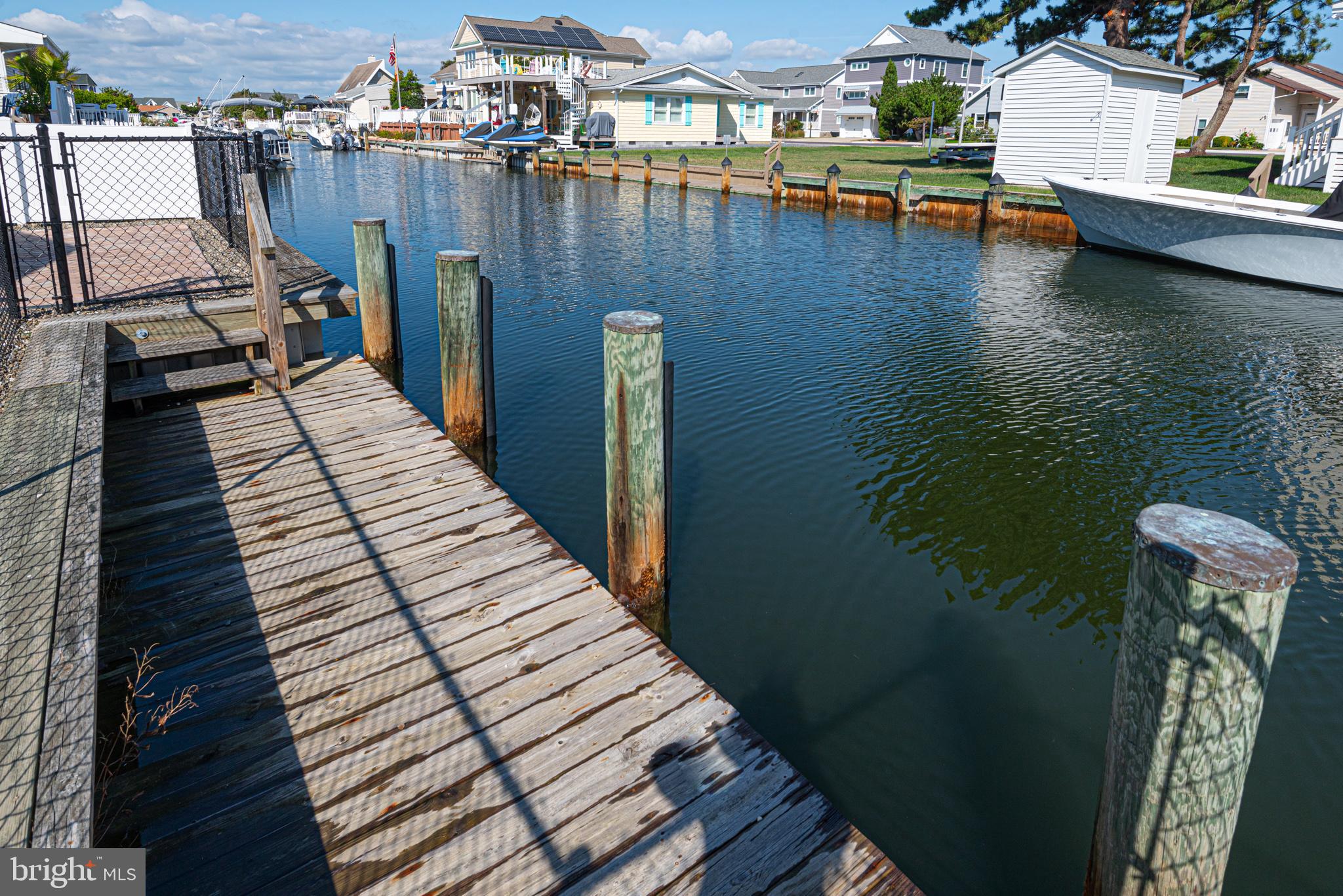 138 Old Wharf Road Ocean City, MD 21842 - Photo 30 of 33 a view of a balcony with chairs