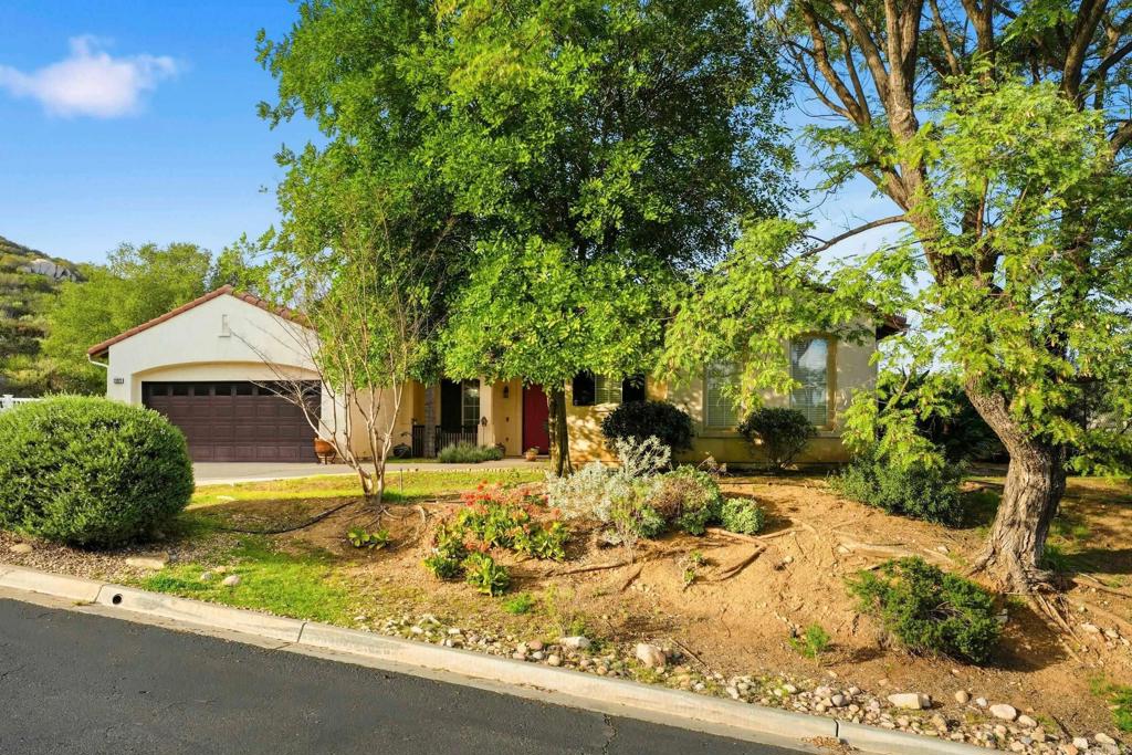 23322 Nuevo Mundo Road Ramona, CA 92065 - Photo 1 of 1 a view of a house with a yard covered in snow