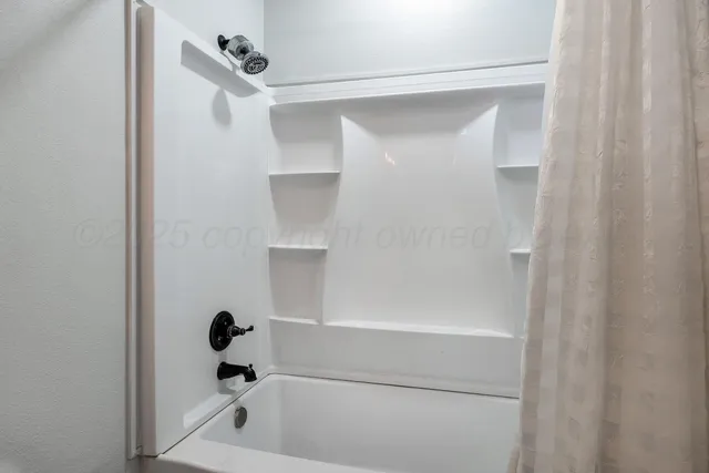 a bathroom with a bathtub