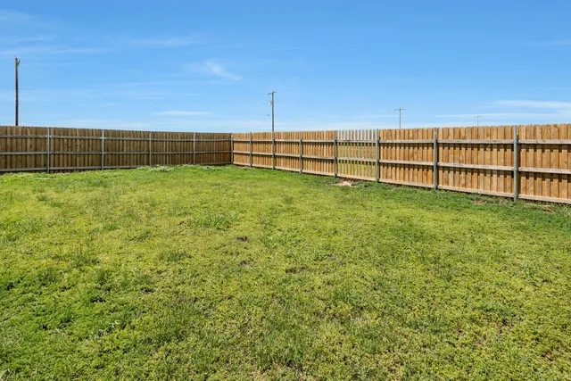 a view of an outdoor space and a yard