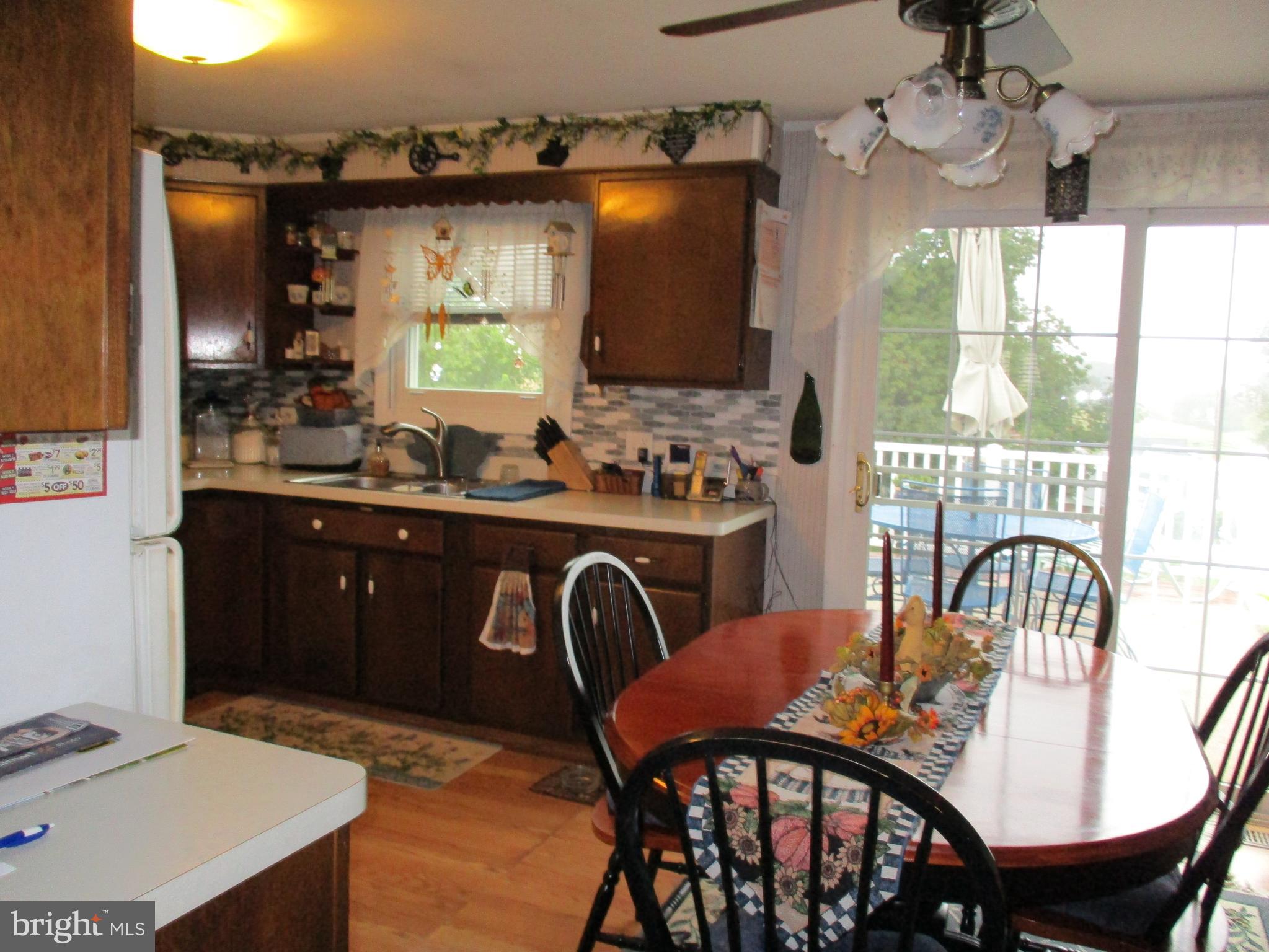 21 Locust Street Spring Grove, PA 17362 - Photo 25 of 58 Entertaining on deck in summer