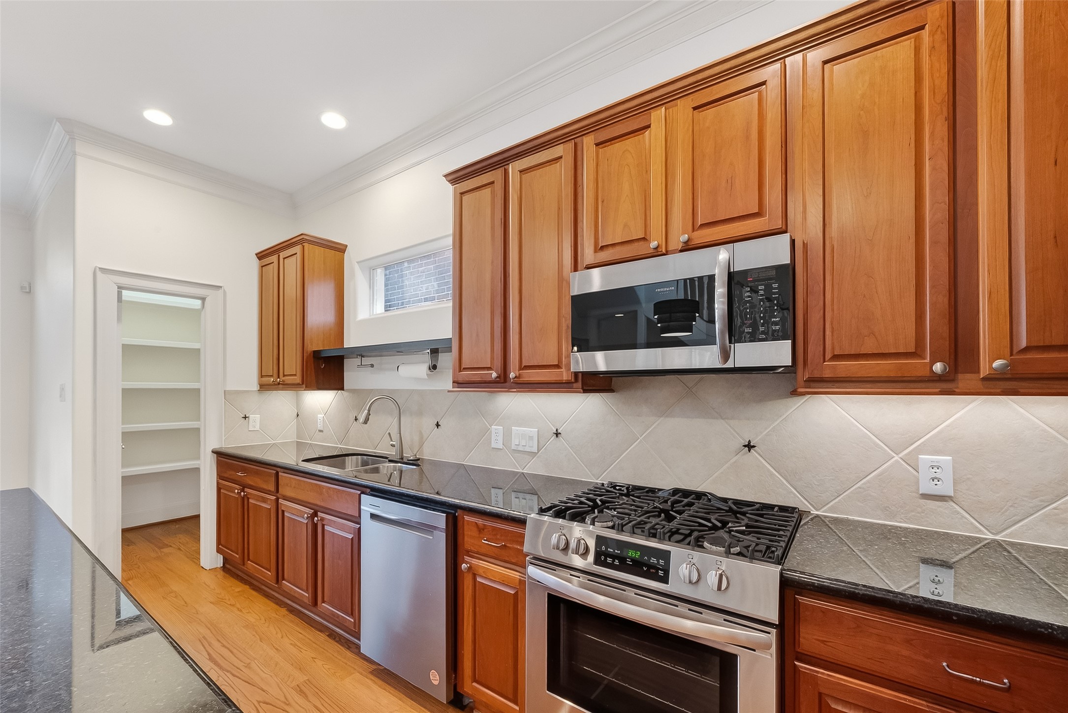 1004 Stanford Street, Unit A Houston, TX 77019 - Photo 17 of 38 generous walk in pantry off the kitchen