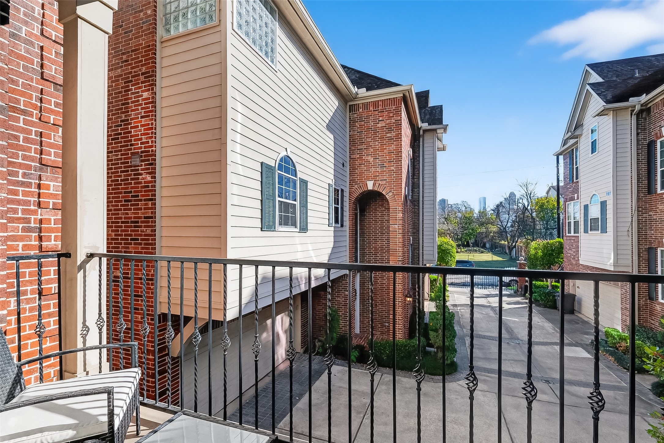 1004 Stanford Street, Unit A Houston, TX 77019 - Photo 19 of 38 double doors greets you as you step out into your private balcony with space for seating
