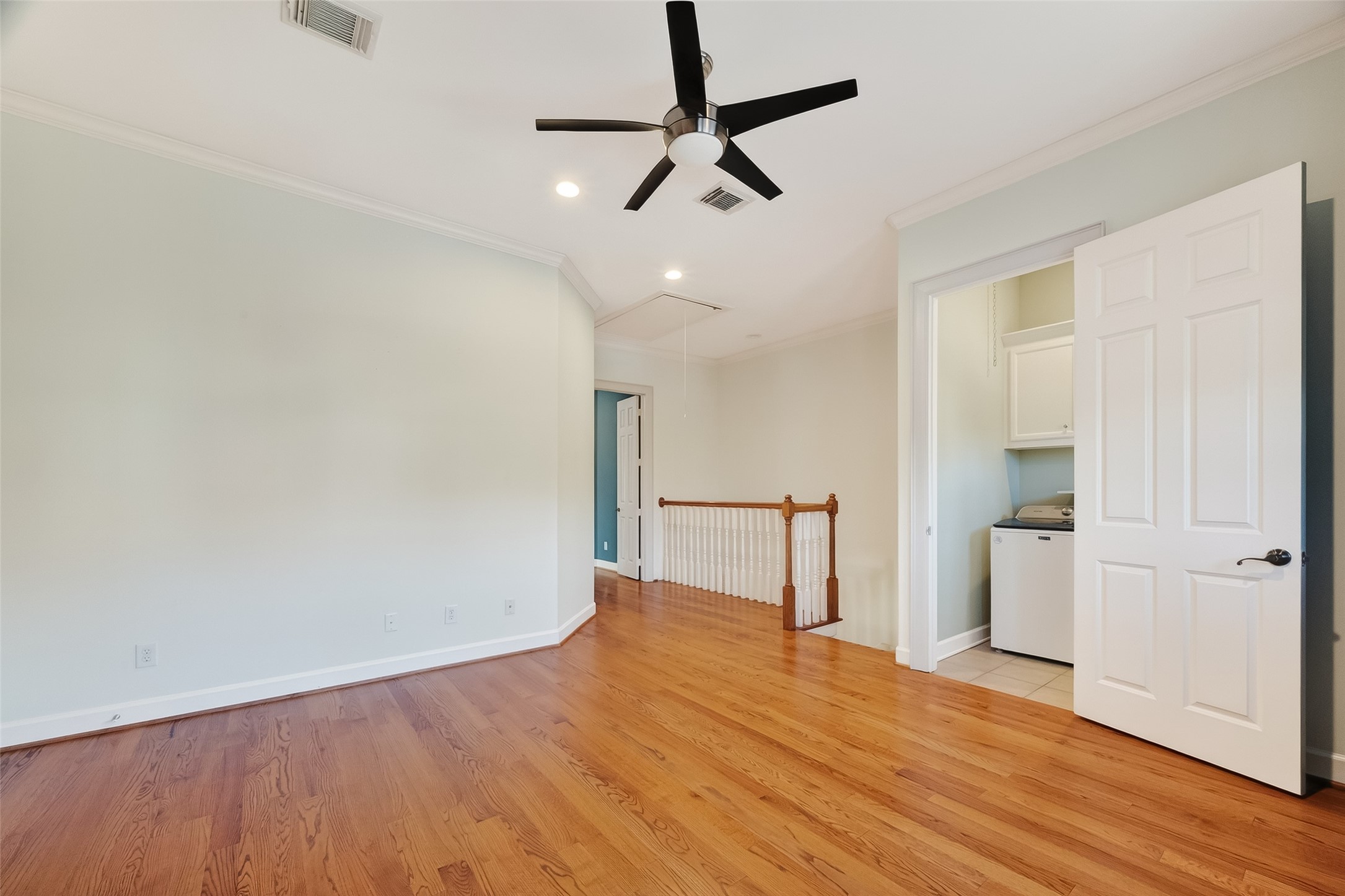 1004 Stanford Street, Unit A Houston, TX 77019 - Photo 25 of 38 another view of bonus space, can be used as cues bedroom, office, home gym or play room. Utility room sits off the bonus room. Washer & dryer are included