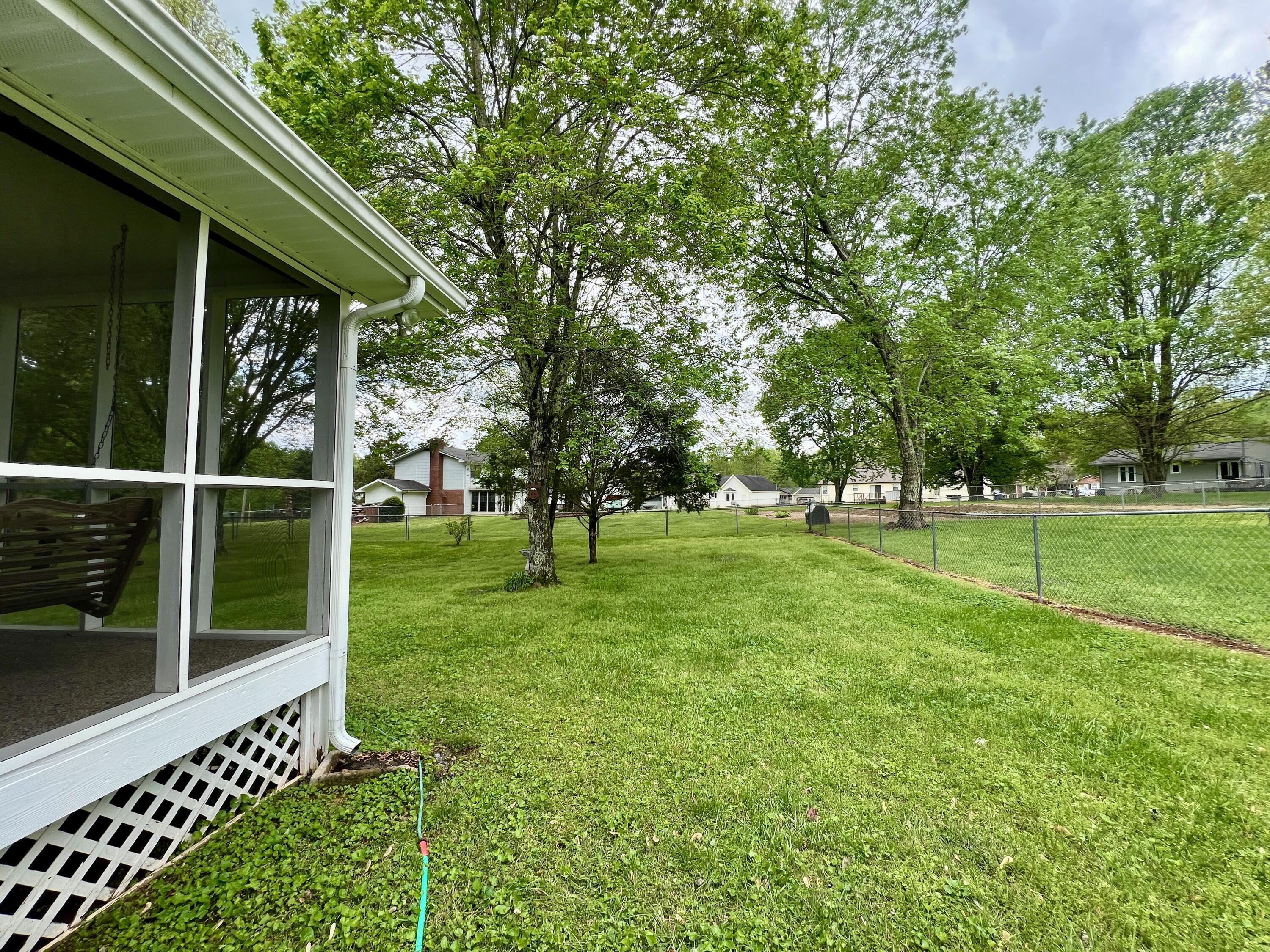 5648 Tucker Road Ooltewah, TN 37363 - Photo 14 of 27 Fenced Backyard