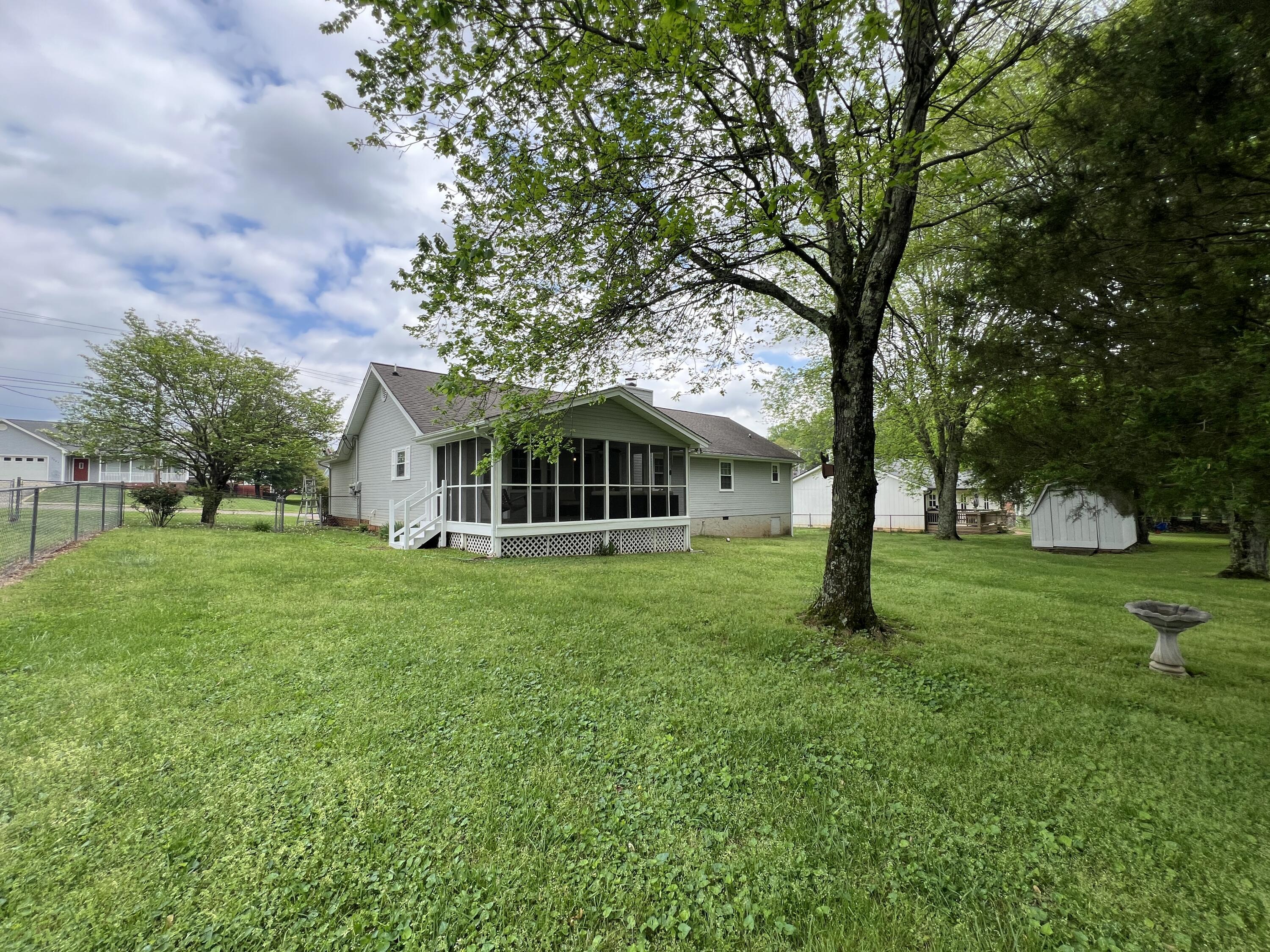 5648 Tucker Road Ooltewah, TN 37363 - Photo 16 of 27 Fenced Backyard
