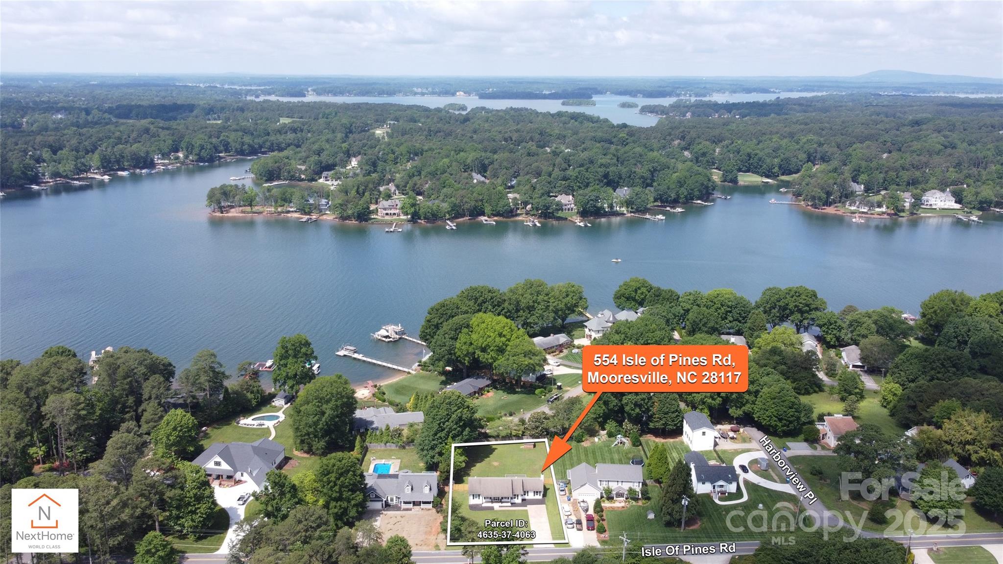 554 Isle Of Pines Road Mooresville, NC 28117 - Photo 1 of 44 an aerial view of a house with a lake view