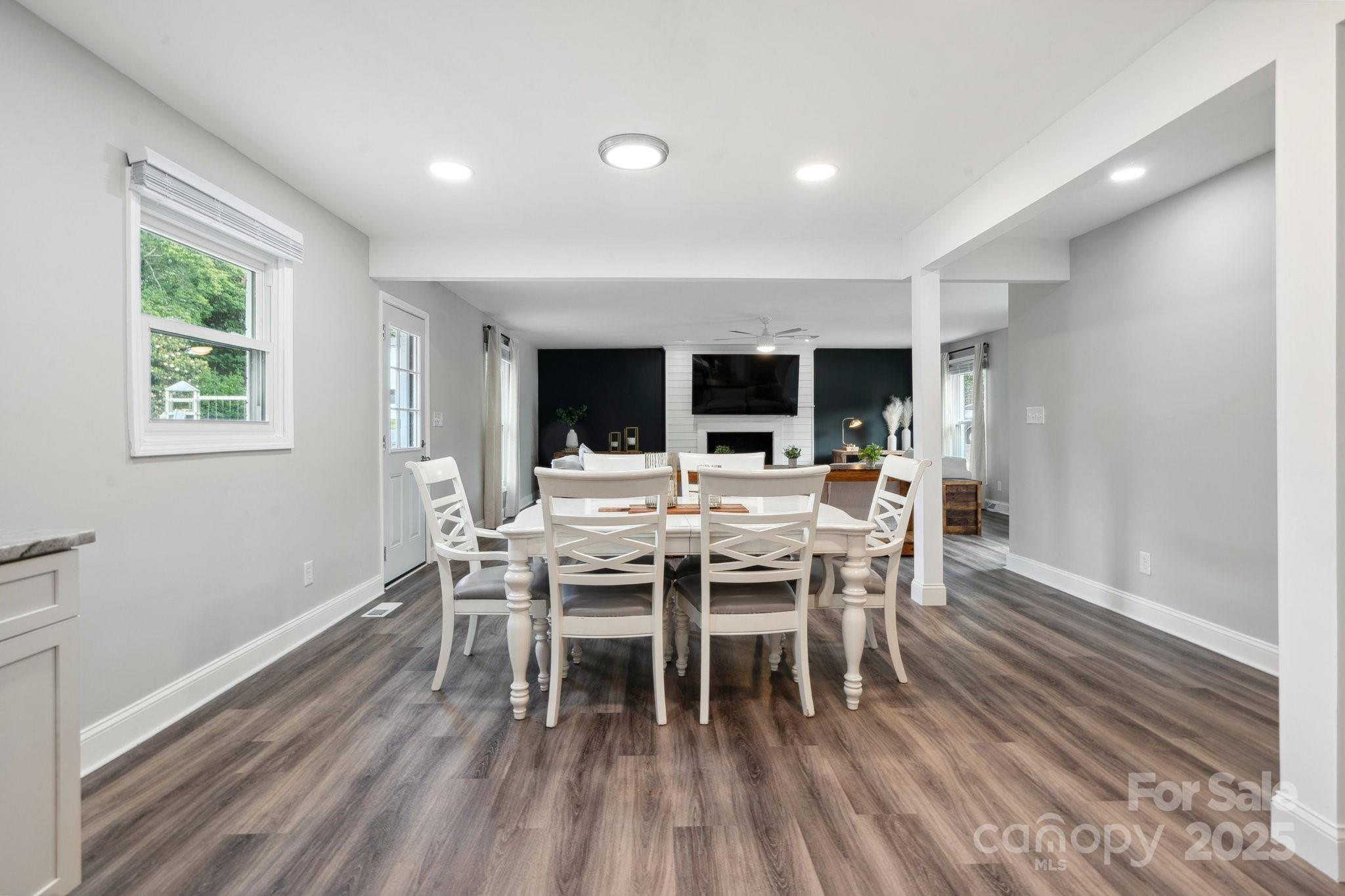 554 Isle Of Pines Road Mooresville, NC 28117 - Photo 16 of 44 a dining room with furniture and window