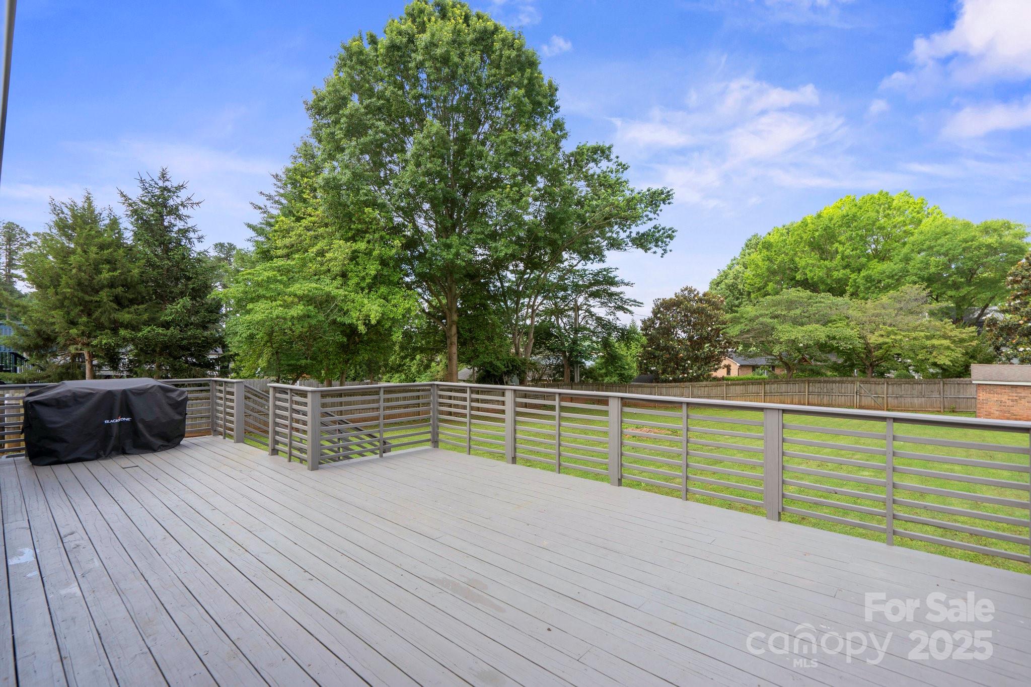 554 Isle Of Pines Road Mooresville, NC 28117 - Photo 30 of 44 a view of a terrace with a bench