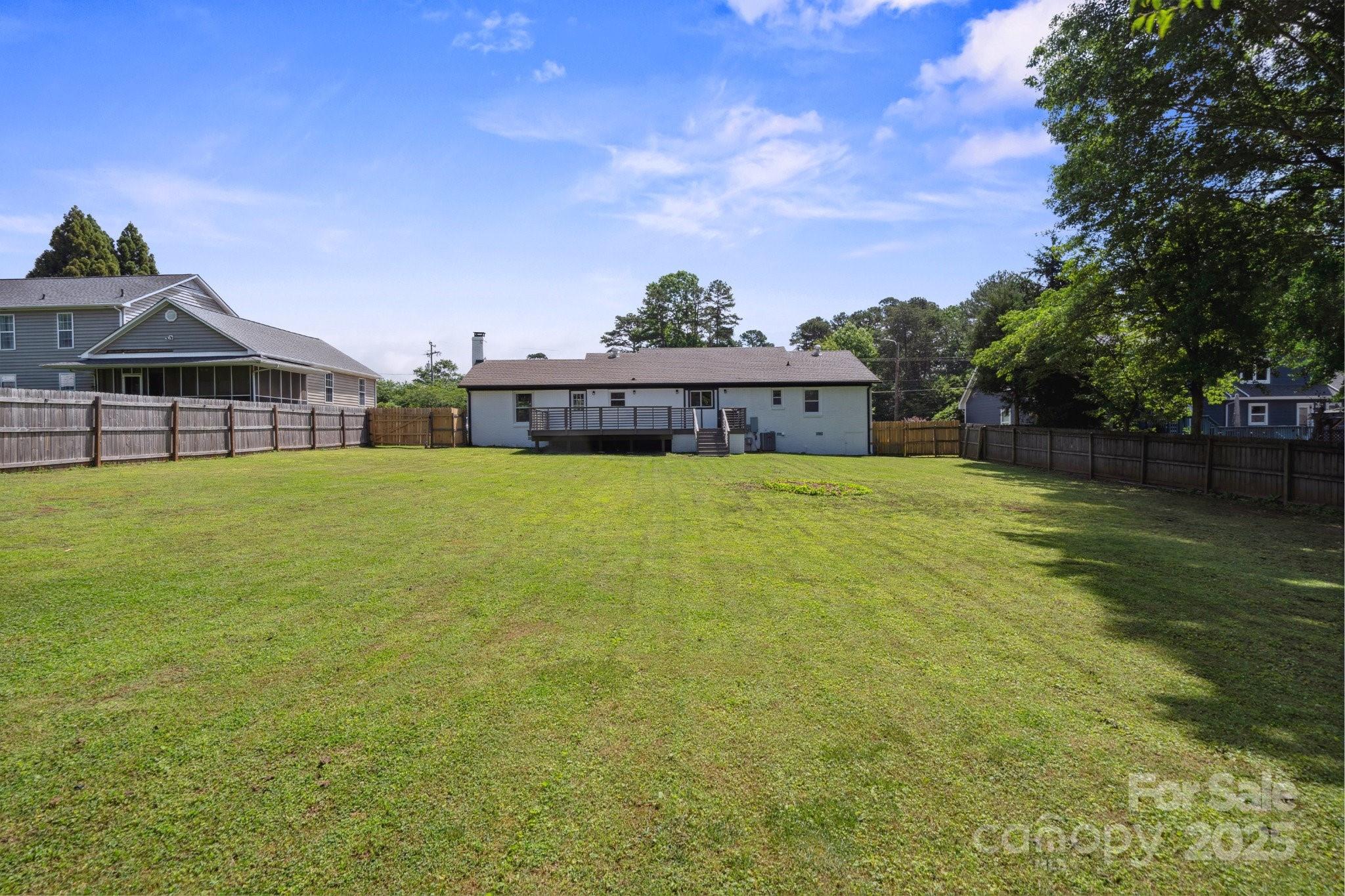 554 Isle Of Pines Road Mooresville, NC 28117 - Photo 32 of 44 a view of a house with a yard