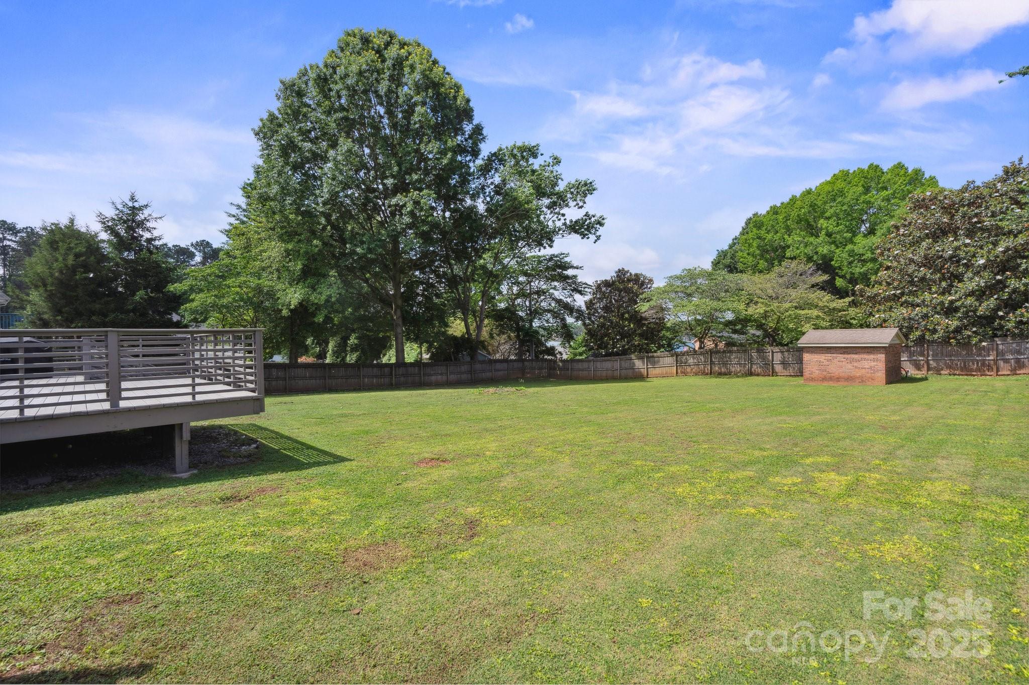 554 Isle Of Pines Road Mooresville, NC 28117 - Photo 35 of 44 a view of a yard with a house