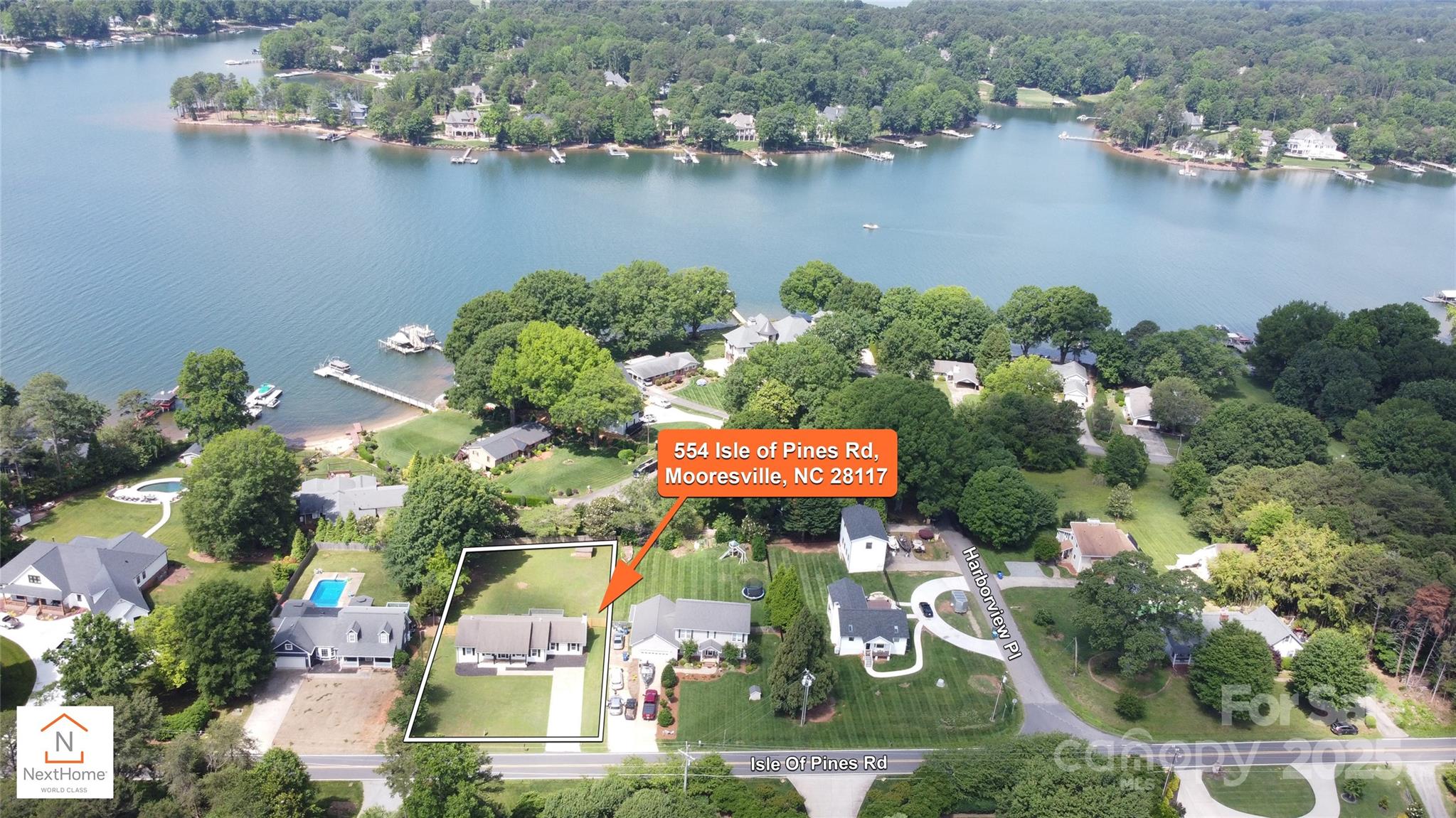 554 Isle Of Pines Road Mooresville, NC 28117 - Photo 44 of 44 an aerial view of a house with a lake view