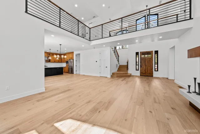 a view of a livingroom with wooden floor
