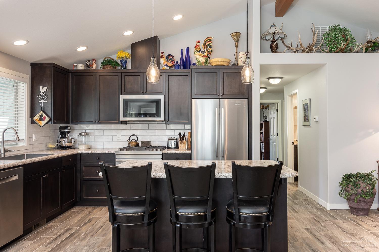 60281 Cheyenne Road Bend, OR 97702 - Photo 9 of 25 Added carrera marble back splash, rich d