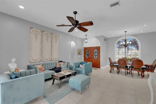 a very nice looking dining room with a table and chairs