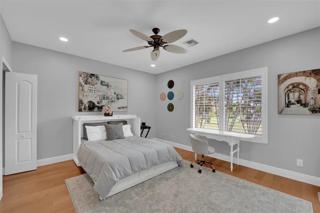 2436 Deborah Drive Punta Gorda, FL 33950 - Photo 31 of 66 a bedroom with a bed and a window