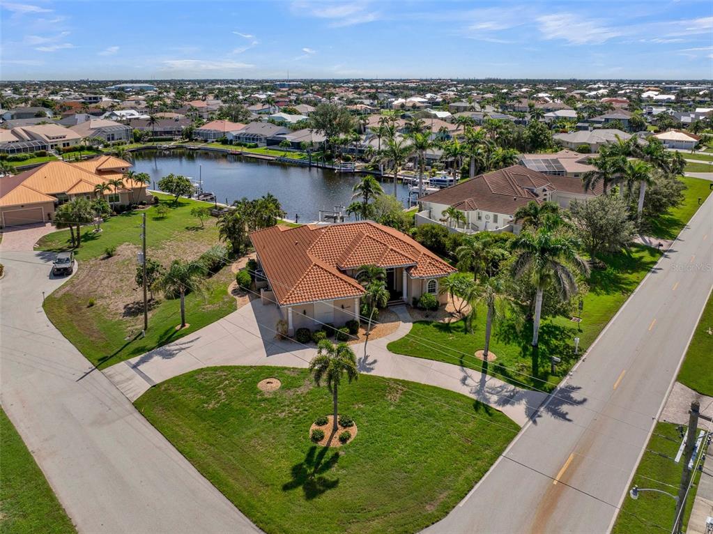 2436 Deborah Drive Punta Gorda, FL 33950 - Photo 46 of 66 an aerial view of a house with a yard and lake view