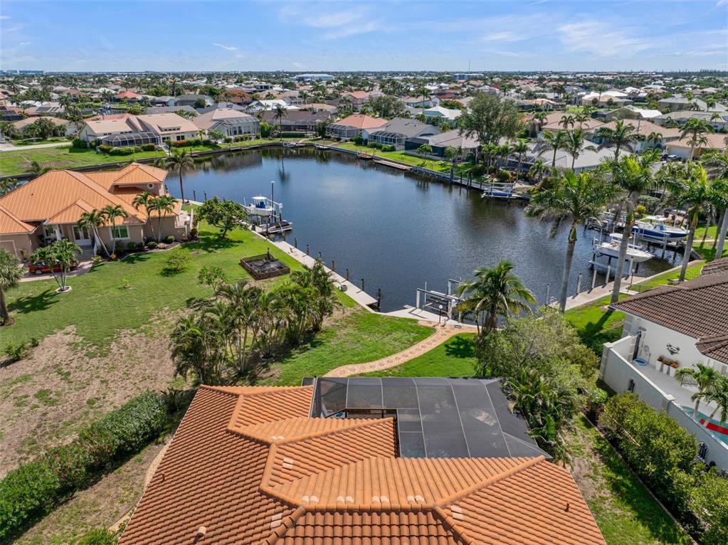 2436 Deborah Drive Punta Gorda, FL 33950 - Photo 48 of 66 an aerial view of a house with a lake view