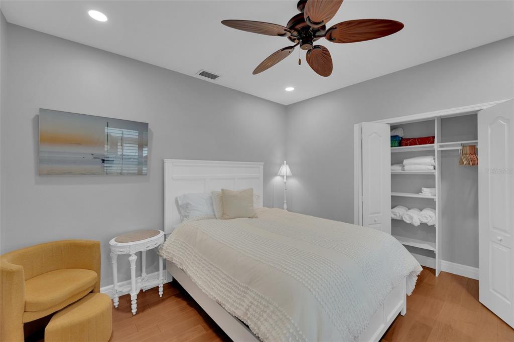 2436 Deborah Drive Punta Gorda, FL 33950 - Photo 53 of 66 a bedroom with a bed and a chair