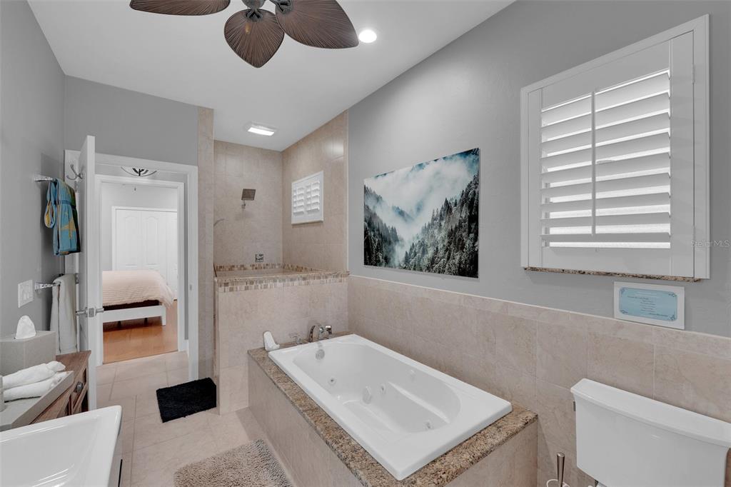 2436 Deborah Drive Punta Gorda, FL 33950 - Photo 55 of 66 a bathroom with a sink a toilet and a bathtub