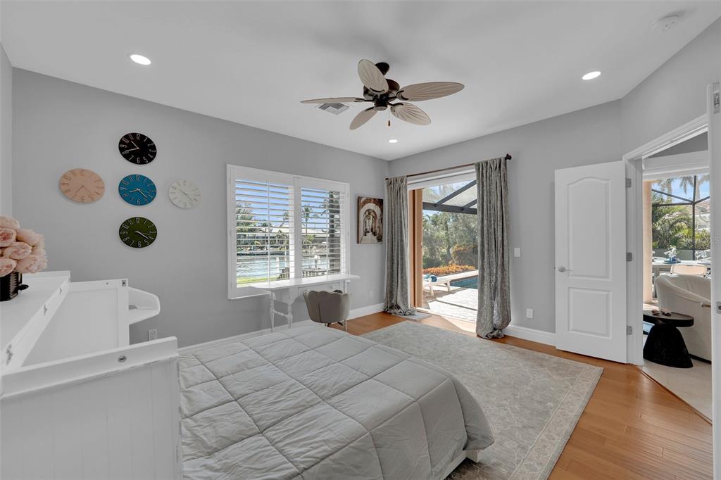 2436 Deborah Drive Punta Gorda, FL 33950 - Photo 61 of 66 a bedroom with a bed and a large window