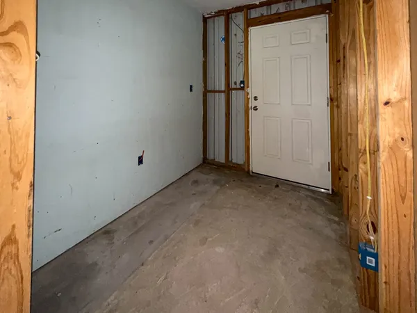 a view of bathroom with a shower and toilet