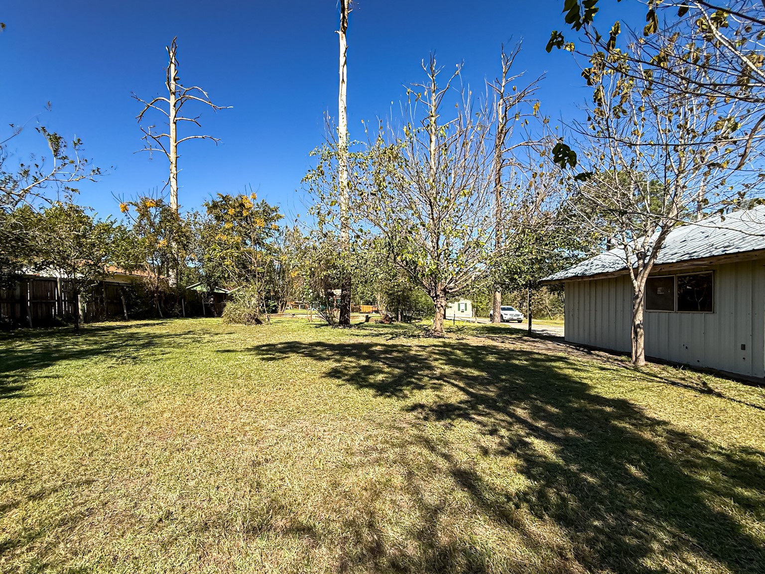 142 West Hickory Cove Onalaska, TX 77360 - Photo 26 of 32 a view of a house with a yard