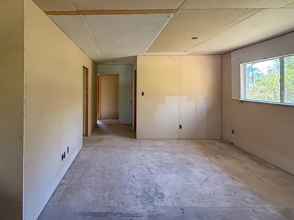 an empty room with windows