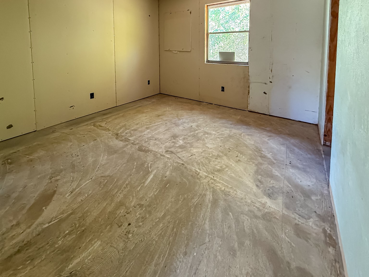 142 West Hickory Cove Onalaska, TX 77360 - Photo 7 of 32 a view of a room that has a window in it
