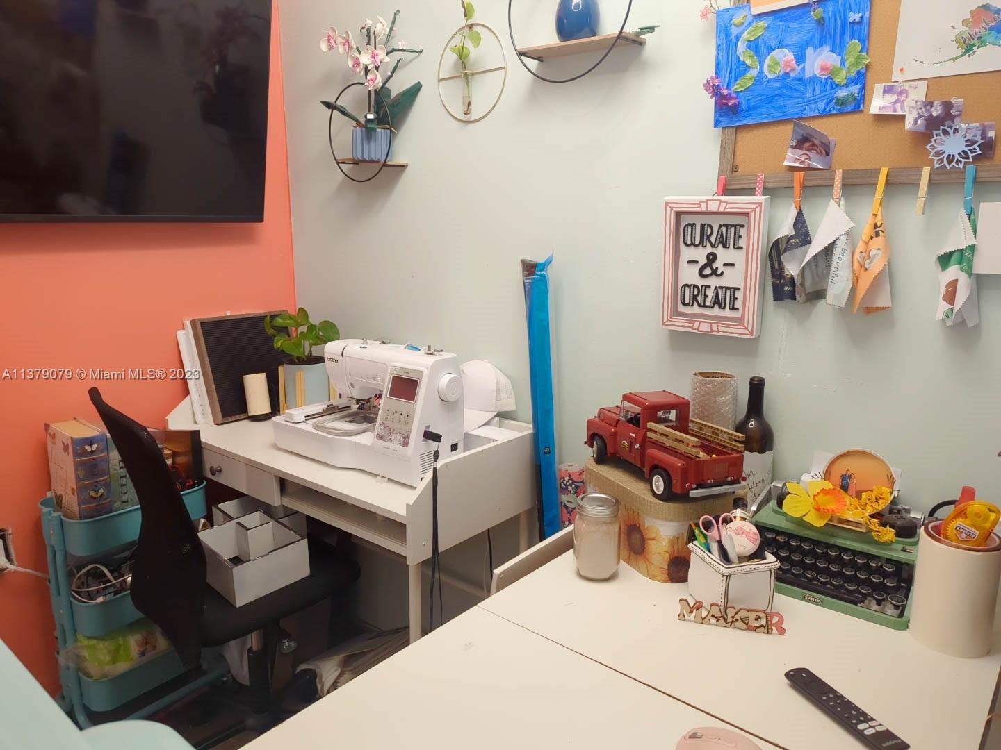 14735 Southwest 302nd Street Homestead, FL 33033 - Photo 14 of 23 a view of a workspace with furniture