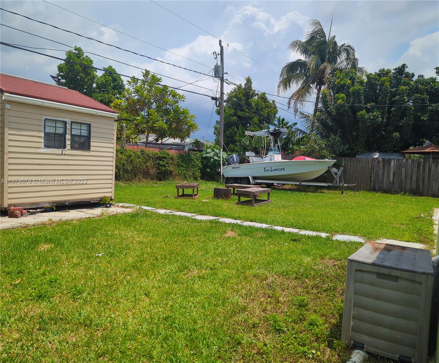 14735 Southwest 302nd Street Homestead, FL 33033 - Photo 20 of 23 a view of a house with a yard porch and sitting area