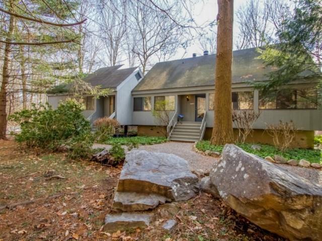 4 Musket Ridge Road Wilton, CT 06897 - Photo 1 of 1 front view of a house with a yard