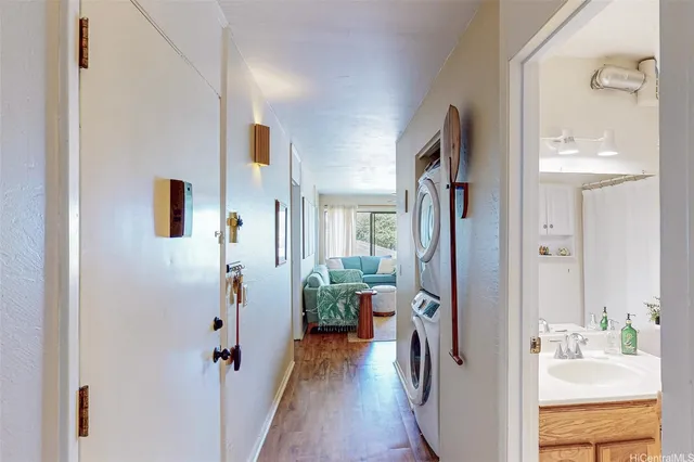 a view of a walk in closet and bathroom
