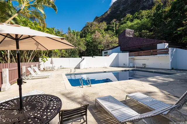 a view of a street with plants
