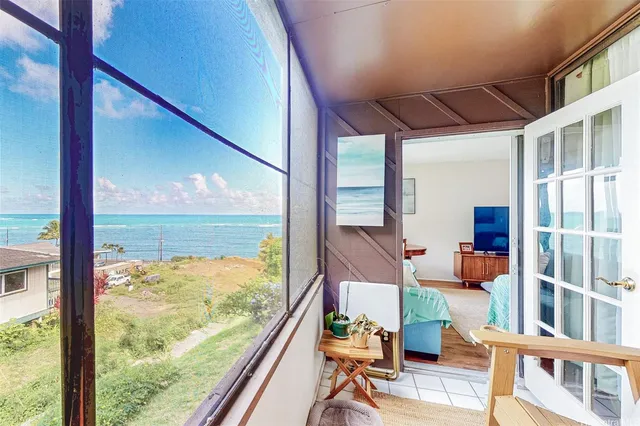 a view of swimming pool from a balcony