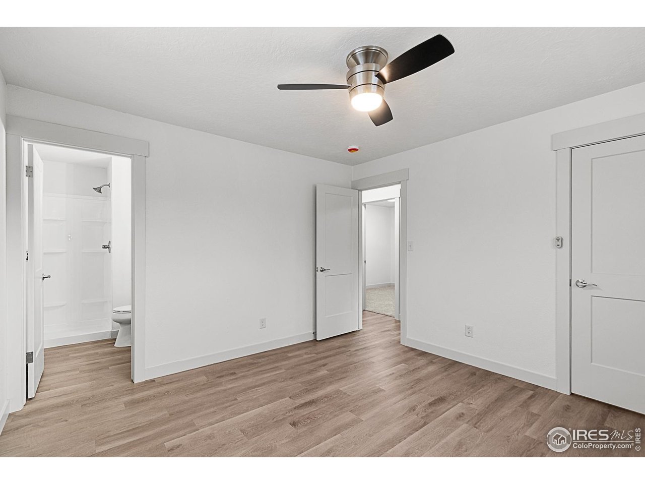 2301 33rd Avenue Greeley, CO 80634 - Photo 14 of 50 wooden floor in an empty room