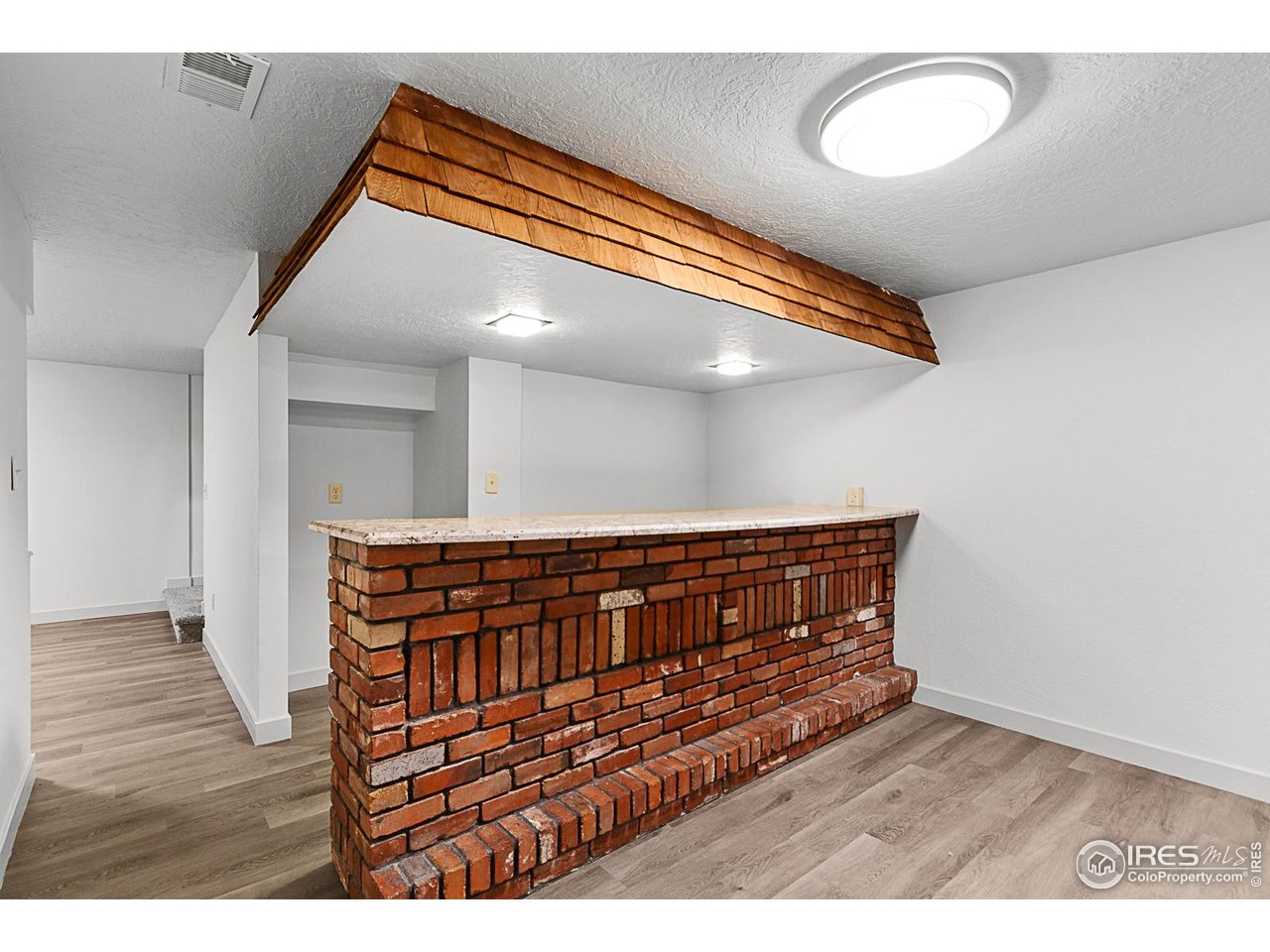 2301 33rd Avenue Greeley, CO 80634 - Photo 24 of 50 a view of wooden floor