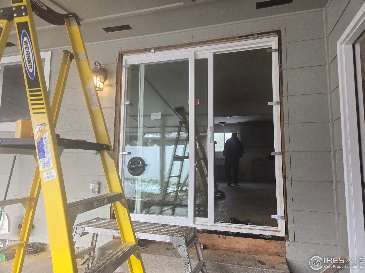 2301 33rd Avenue Greeley, CO 80634 - Photo 44 of 50 a view of an entryway with wooden floor and door