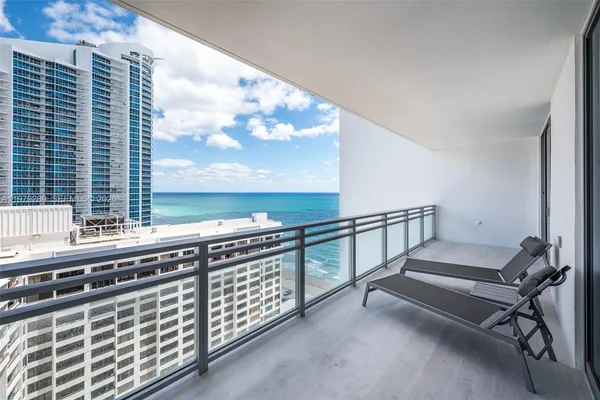 a view of building with ocean view