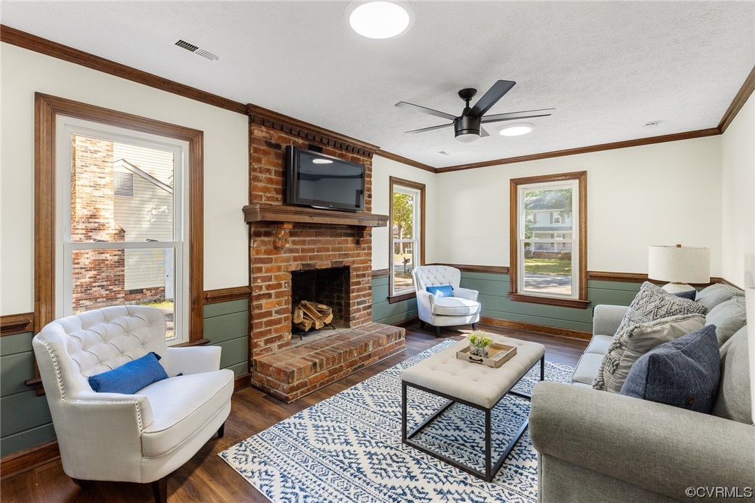 6940 Manning Road Chesterfield, VA 23832 - Photo 14 of 29 Hardwood floored living room with brick wall, crow
