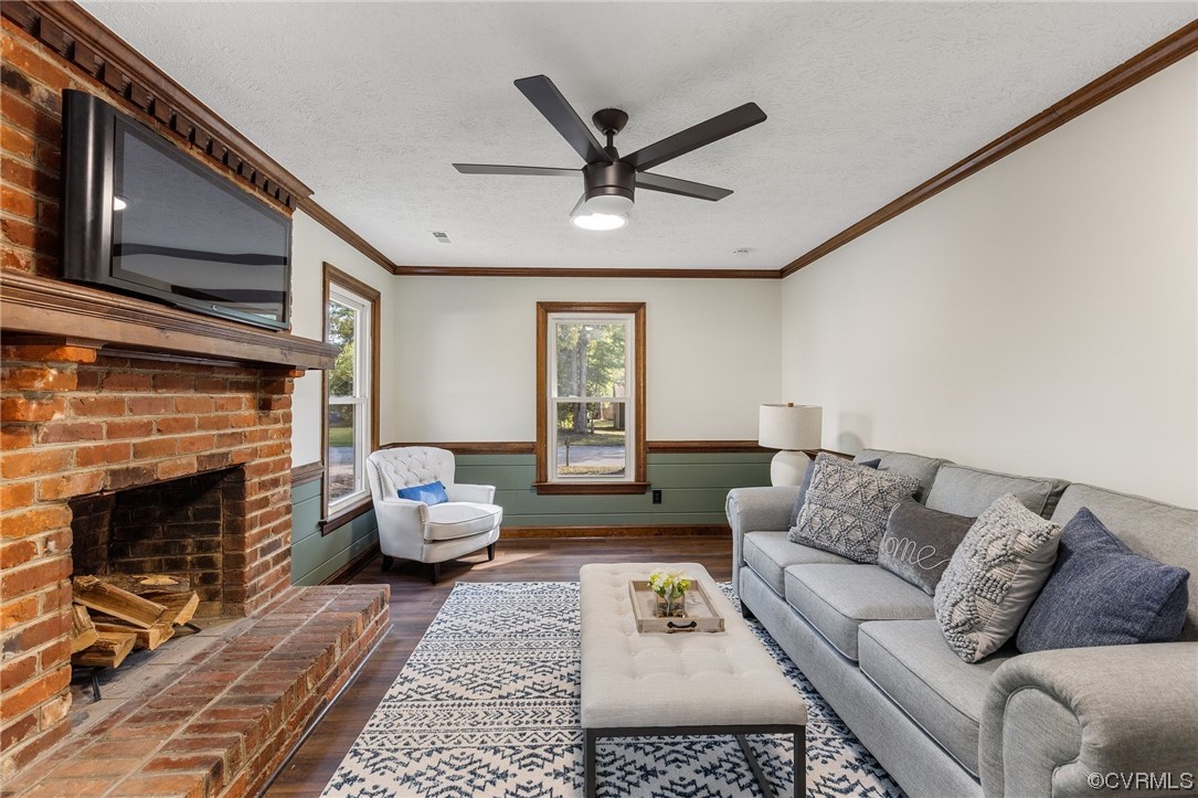 6940 Manning Road Chesterfield, VA 23832 - Photo 16 of 29 Hardwood floored living room with brick wall, crow