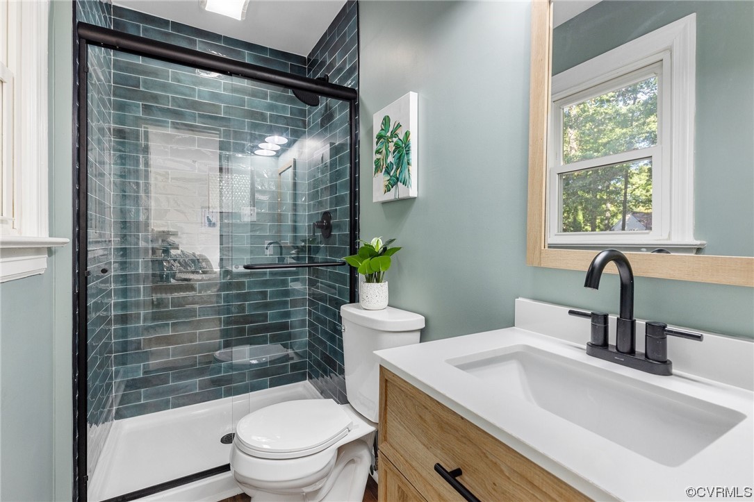 6940 Manning Road Chesterfield, VA 23832 - Photo 19 of 29 Bathroom with walk in shower, large vanity, and to