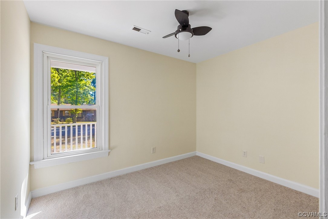 6940 Manning Road Chesterfield, VA 23832 - Photo 20 of 29 Carpeted spare room featuring ceiling fan