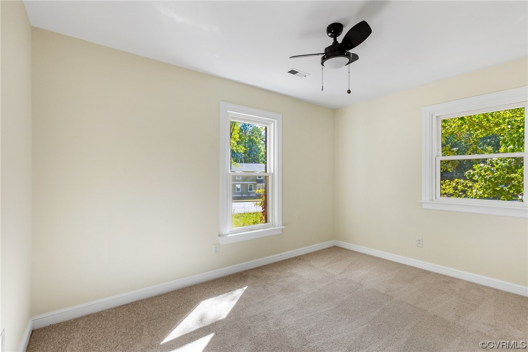 6940 Manning Road Chesterfield, VA 23832 - Photo 21 of 29 Carpeted empty room with ceiling fan