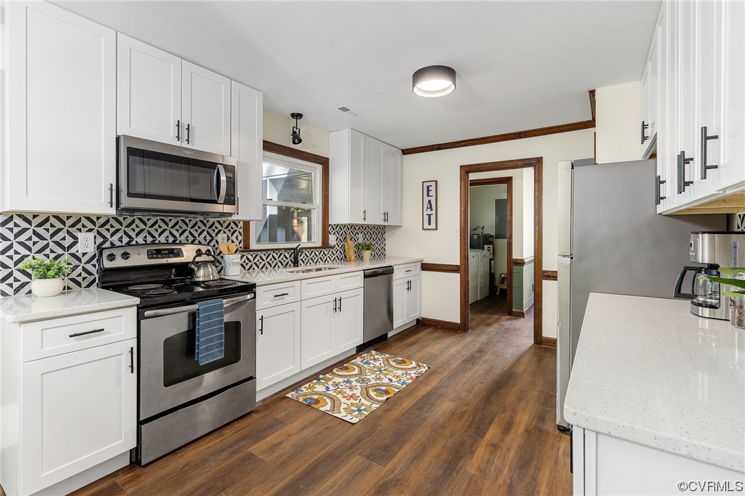 6940 Manning Road Chesterfield, VA 23832 - Photo 7 of 29 Kitchen featuring dark hardwood flooring, stainles